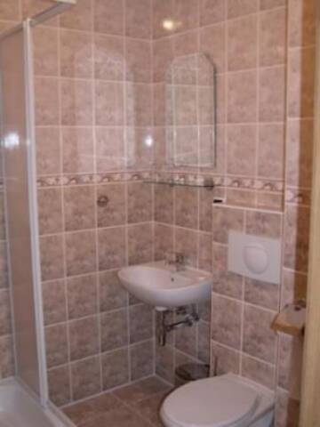 Фото номера Двухместный номер с 2 отдельными кроватями Отель Hotel Sukiennice г. Хойнице 9